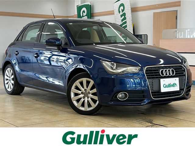 アウディ Ａ１ スポーツバック 1．4TFSI 道央・札幌 2013(平25)年 7.1万km 紺 ・ワンオーナー/・純正ナビ/フルセグTV/DVD/CD/SD/・パドルシフト/・横滑り防止/・ETC/・HID/・プッシュスタート/・スマートキー/・電格ミラー/・ミラーヒーター/・冬タイヤ純正15インチAW積込