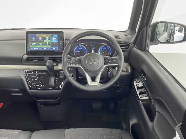 三菱 デリカミニ T プレミアム リミテッド ED 愛知県 2025(令7)年 0.1千km アメジストブラック/シルキーホワイト 未使用車・新車/９型ディスプレイオーディオ/全方位カメラ/Bluetooth・AppleCarPlay・AndroidAuto・USB/ルーフレール/ファブリック＆合皮シート/前席シートヒーター/純正フロアマット/ヒルディセントコントロール/ヒルスタートアシスト/アイドリングストップ/ACC/車線維持支援/車線逸脱警報/先行車発進告知/LEDヘッドライト/オートライト/オートマチックハイビーム/革巻きステアリング/ステアリングスイッチ/パドルシフト/電子パーキングブレーキ/オートホールド/スマートキー/プッシュスタート/スペアキー/新車保証書・取扱説明書