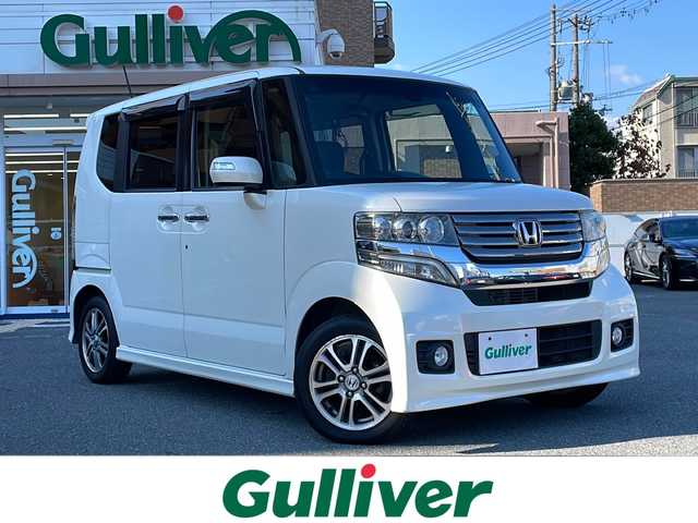 ホンダ Ｎ ＢＯＸ カスタム G Aパッケージ 大阪府 2014(平26)年 6.2万km プレミアムホワイトパール ワンオーナー/社外メモリナビ/バックカメラ/Bluetooth/フルセグテレビ/衝突軽減防止装置（CTBA）/片側パワースライドドア/ETC/HIDヘッドランプ/プッシュスタート/純正14インチアルミホイール