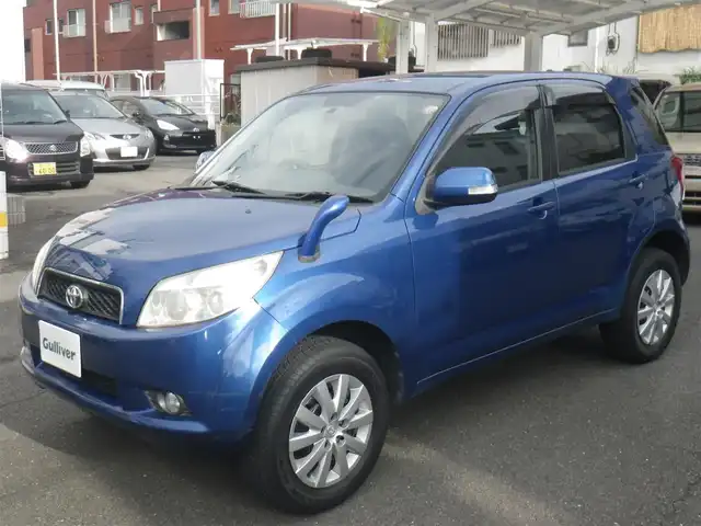 トヨタ ラッシュ G 神奈川県 2006(平18)年 9.3万km ブルーマイカM 4WD/マニュアル/純正CD/CSオーディオ/スマートキー/スペアキー/ETC/フォグランプ/背面タイヤハードカバー/取説書/保証書/点検記録（全てトヨタディーラーで実施）/　R5/1  R7/1