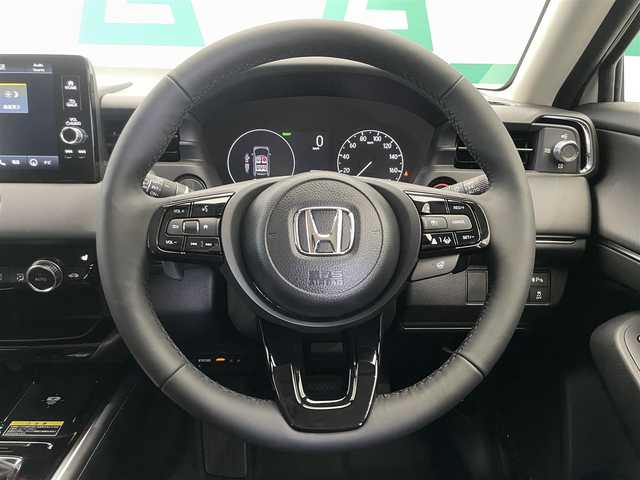 ホンダ ヴェゼル ハイブリッド e:HEV Z 鹿児島県 2025(令7)年 0.1千km プラチナホワイトパール 登録未使用車/バックカメラ/Honda CONNECTディスプレー/　・Bluetooth接続/　・AppleCarplay/　・AndroidAuto/　・フルセグTV/ブラインドスポットモニター/ETC2.0車載器/ワイヤレス充電器/電動格納ミラー/本革巻きステアリング/電動パーキングブレーキ/ブレーキホールド/Honda SENSING/　・前方後方誤発進抑制/　・先行車発進お知らせ