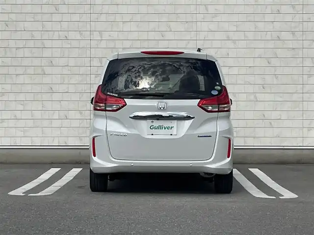 ホンダ フリード ハイブリット G ホンダセンシング 福岡県 2020(令2)年 1.7万km プラチナホワイトパール 純正7型SDナビ(フルセグTV/CD/DVD/BT)/バックカメラ/ホンダセンシング/コーナーセンサー(後方)/両側パワスラ/レーダークルコン/前後ドラレコ/ETC/シートヒーター/純正LEDヘッドライト/純正15インチアルミホイール/純正フロアマット/USBポート/スマートキー/プッシュスタート