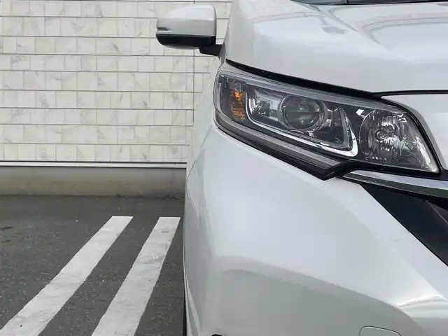 ホンダ フリード ハイブリット G ホンダセンシング 福岡県 2020(令2)年 1.7万km プラチナホワイトパール 純正7型SDナビ(フルセグTV/CD/DVD/BT)/バックカメラ/ホンダセンシング/コーナーセンサー(後方)/両側パワスラ/レーダークルコン/前後ドラレコ/ETC/シートヒーター/純正LEDヘッドライト/純正15インチアルミホイール/純正フロアマット/USBポート/スマートキー/プッシュスタート