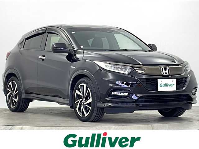 ホンダ ヴェゼル ハイブリッド RS ホンダセンシング 大阪府 2018(平30)年 6.3万km クリスタルブラックパール ワンオーナー/純正８型ナビ(フルセグTV/AM/FM/CD/DVD/HDMI/BT/USB)/バックカメラ/ＥＴＣ/前方ドライブレコーダー/ホンダセンシング/・衝突軽減ブレーキ/・誤発信抑制機能/・歩行者事故低減ステアリング/・路外逸脱抑制機能/・アダプティブ・クルーズ・コントロール/・車線維持支援システム/・先行者発信お知らせ機能/・標識認識機能/アイドリングストップ/オートライト/盗難防止装置/ハーフレザー/シートヒーター/スマートキー/スペアキー/純正ＡＷ/純正フロアマット