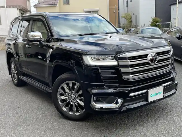 トヨタ ランドクルーザー ZX 神奈川県 2023(令5)年 0.4万km ブラック ワンオーナー/サンルーフ/ベージュ革シート/モデリスタエアロ(F/R)/クールBOX/純正メモリーナビ・地デジTV/リヤエンターテイメント/JBLスピーカー/純正CD/DVD/SD/MSV/BT/USB/Miracast/パノラマモニター/ビルトインETC2.0/前後ドライブレコーダー/前席パワーシート/1・2列目シートヒーター・エアシート/ステアリングヒーター/純正20インチAW/LEDライト/LEDフォグライト/パワーバックドア/3列目電動格納シート/トヨタセーフティセンス/レーダークルーズコントロール/PCS/LTA/BSM/PKSB/RCTA/RSA/コーナーセンサー/オートハイビーム/HUD/AC100V/純正エンジンスターター/デフロック/プッシュスタート/スマートキー×2/R6年ディーラー整備記録/保証書・取説あり