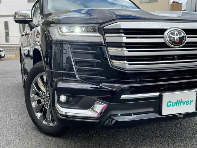 トヨタ ランドクルーザー ZX 神奈川県 2023(令5)年 0.4万km ブラック ワンオーナー/サンルーフ/ベージュ革シート/モデリスタエアロ(F/R)/クールBOX/純正メモリーナビ・地デジTV/リヤエンターテイメント/JBLスピーカー/純正CD/DVD/SD/MSV/BT/USB/Miracast/パノラマモニター/ビルトインETC2.0/前後ドライブレコーダー/前席パワーシート/1・2列目シートヒーター・エアシート/ステアリングヒーター/純正20インチAW/LEDライト/LEDフォグライト/パワーバックドア/3列目電動格納シート/トヨタセーフティセンス/レーダークルーズコントロール/PCS/LTA/BSM/PKSB/RCTA/RSA/コーナーセンサー/オートハイビーム/HUD/AC100V/純正エンジンスターター/デフロック/プッシュスタート/スマートキー×2/R6年ディーラー整備記録/保証書・取説あり