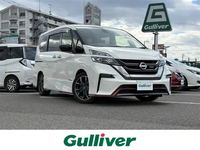 日産 セレナ ニスモ 大分県 2019(平31)年 6.5万km ブリリアントホワイトパール ・純正ナビ（CD/DVD/SD/BT/USB）/・アラウンドビューモニター/・プロパイロット/・フルセグテレビ/・フリップダウンモニター/・エマージェンシーブレーキ/・コーナーセンサー/・ブレーキホールド/・デジタルインナーミラー/・ドライブレコーダー/・ETC/・ステアリングリモコン/・純正アルミホイール