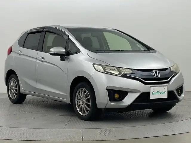 ホンダ フィット 13G Fパッケージ 新潟県 2015(平27)年 11.8万km シルバー プッシュスタート/スマートキー/メモリナビ　型式AVIC-RZ09/CD/BT/DVD/フルセグ/社外アルミ15インチ/冬タイヤ4本積み込み/フォグ/ハロゲン/フロアマット
