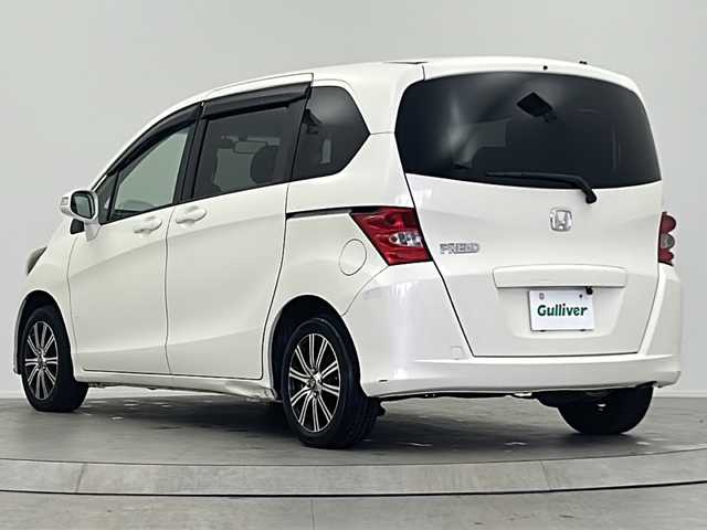 ホンダ フリード G ジャストセレクション 大阪府 2011(平23)年 11.8万km プレミアムホワイトパール 社外７インチSDナビ（MDV-D404BT）/TV/CD/DVD/ブルートゥース/バックカメラ/片側パワースライドドア/ETC/前方ドライブレコーダー/社外１５インチAW