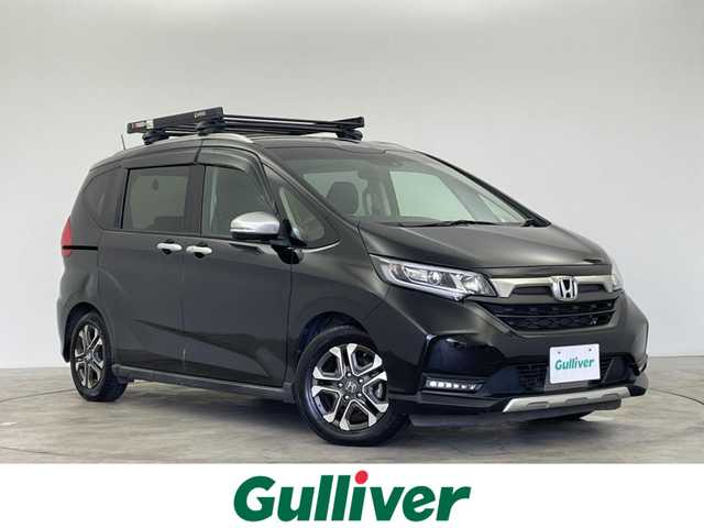ホンダ フリード＋ クロスター ホンダセンシング 群馬県 2021(令3)年 4.2万km クリスタルブラックパール 禁煙車　純正ナビ　Ｂｌｕｅｔｏｏｔｈ　フルセグ　両側パワースライドドア　バックカメラ　ホンダセンシング　追従クルーズコントロール　レーンキープアシスト　コーナーセンサー　ビルトインＥＴＣ