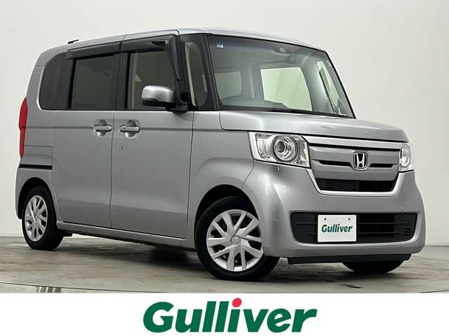 ホンダ Ｎ ＢＯＸ G L ホンダセンシング 長崎県 2019(令1)年 8.1万km ルナシルバーM ワンオーナー/純正メモリナビ/(VXM-204VFI)/(フルセグTV/BT/USB/CD/DVD/SD/AUX/ipod)/バックカメラ/ホンダセンシング/・衝突軽減ブレーキ/・誤発進抑制機能/・歩行者事故低減ステアリング/・先行者発進お知らせ機能/・アダプティブクルーズコントロール/・車線維持支援システム/・オートハイビーム/・路外逸脱抑制機能/前後方ドライブレコーダー/(ZDR015)/前席シートヒーター/パワースライドドア/LEDヘッドライト/オートライト/オートハイビーム/後席ロールサンシェード/オートエアコン/純正フロアマット/スマートキー/スペアキー/取扱説明書/保証書/社外ホイール＋スタッドレスタイヤ車載