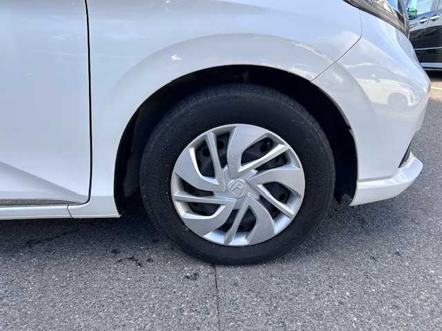 ホンダ フリード G ホンダセンシング 大阪府 2021(令3)年 2.6万km プラチナホワイトパール 純正９インチナビ　/フルセグ　/Ｂｌｕｅｔｏｏｔｈ　/バックカメラ　/フリップダウンモニター　/両側パワースライドドア　/シートヒーター　/レーダークルーズコントロール　/ＬＥＤヘッドライト　/ＥＴＣ　/ドラレコ