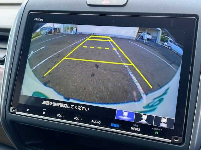 ホンダ フリード G ホンダセンシング 大阪府 2021(令3)年 2.6万km プラチナホワイトパール 純正９インチナビ　/フルセグ　/Ｂｌｕｅｔｏｏｔｈ　/バックカメラ　/フリップダウンモニター　/両側パワースライドドア　/シートヒーター　/レーダークルーズコントロール　/ＬＥＤヘッドライト　/ＥＴＣ　/ドラレコ