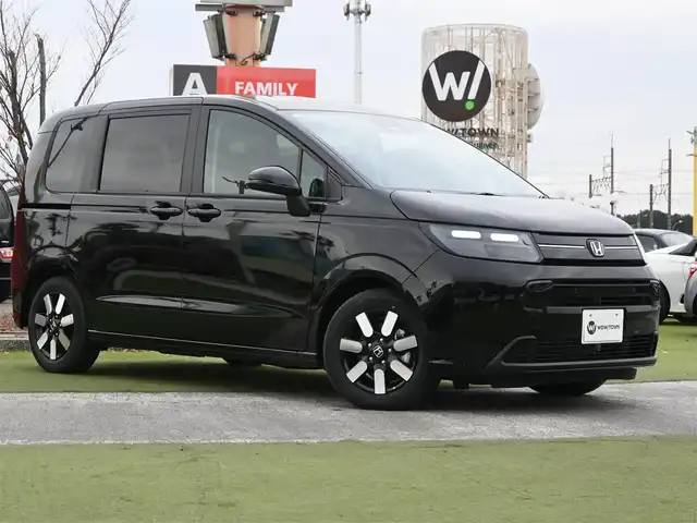 ホンダ フリード ハイブリット e:HEV AIR EX 千葉県 2025(令7)年 0.1千km クリスタルブラックパール ホンダセンシング/・衝突軽減ブレーキ（CMBS）/・車線維持支援システム（LKAS）/・アダプティブクルーズコントロール（ACC）/・ブラインドスポットインフォメーション/・後方誤発進抑制機能/・誤発進抑制機能/両側パワースライドドア/ハーフレザーシート/前席シートヒーター/11.4インチホンダコネクトナビ/地デジTV/【DVD/CD再生機能　Bluetooth接続】/バックカメラ/革巻きステアリング/ステアリングスイッチ/LEDヘッドライト/ウインカーミラー/コーナーセンサー/純正15インチアルミホイル/サイド/カーテンエアバッグ/Honda スマートキー