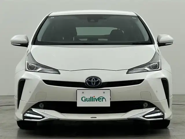 トヨタ プリウス A 福岡県 2019(令1)年 6.8万km ホワイトパールクリスタルシャイン ワンオーナー　/モデリスタエアロ　/純正ナビ（フルセグ）　/バックカメラ　/ドラレコ　/ＥＴＣ　/ＡＣＣ　/コーナーセンサー　/衝突軽減ブレーキ　/レーンキープ　/ＢＳＭ　/ＰＫＳＢ　/ＲＣＴＡ　/パーキングアシスト　/ＨＵＤ