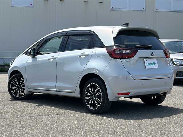 ホンダ フィット e:HEVリュクス 秋田県 2020(令2)年 9.3万km プレミアムサンライトホワイトパール ４WD/純正SDナビ/純正AW/ステアリングヒーター/前後ドライブレコーダー/前後コーナーセンサー