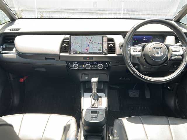 ホンダ フィット e:HEVリュクス 秋田県 2020(令2)年 9.3万km プレミアムサンライトホワイトパール ４WD/純正SDナビ/純正AW/ステアリングヒーター/前後ドライブレコーダー/前後コーナーセンサー