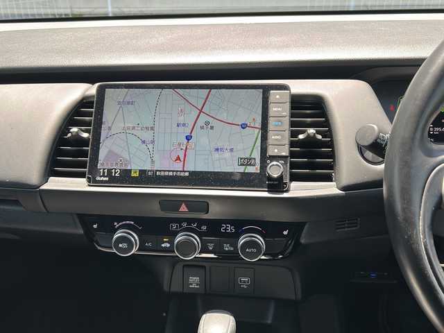 ホンダ フィット e:HEVリュクス 秋田県 2020(令2)年 9.3万km プレミアムサンライトホワイトパール ４WD/純正SDナビ/純正AW/ステアリングヒーター/前後ドライブレコーダー/前後コーナーセンサー