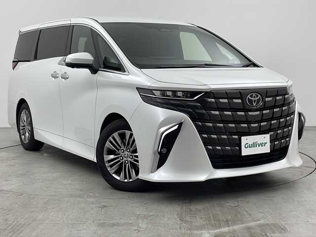 トヨタ アルファード Z 三重県 2024(令6)年 1.2万km プラチナホワイトパールマイカ 禁煙車/ワンオーナー/ツインムーンルーフ/トヨタセーフティセンス/・プリクラッシュセーフティ/・クリアランスソナー/・レーントレーシングアシスト/・レーンディパーチャーアラート/・レーダークルーズコントロール/・アダプティブハイビームシステム/・ロードサインアシスト/・プロアクティブドライビングアシスト/・ブラインドスポットモニター/・ヘッドアップディスプレイ/純正14インチナビ/・AppleCarplay・AndroidAuto・AM・FM・USB・BT/フルセグTV/パノラミックビューモニター/デジタルインナーミラー/前席・二列目シートベンチレーション/前席パワーシート（D席メモリーあり）/ステアリングヒーター/純正18インチアルミ/オットマン/フロアマット/スペアタイヤ/スマートキー/スペアキー/保証書