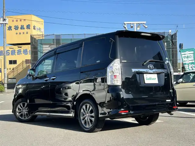 トヨタ ヴォクシー ZS 煌Z 愛媛県 2013(平25)年 9万km ブラック 禁煙車/登録時走行距離89280km/純正ナビ/CD/DVD/TV/Bluetooth/バックカメラ/ビルトインETC/フロントドライブレコーダー/両側パワースライドドア/ハーフレザーシート/回転式セカンドシート/リヤエアコン/オートライト/キセノンヘッドライト/フォグランプ/MTモード付AT/スマートキー