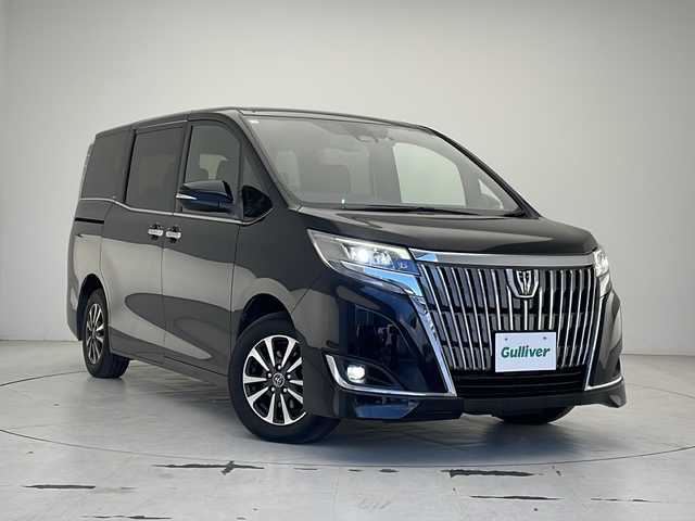 トヨタ エスクァイア Gi プレミアムパッケージ 沖縄県 2018(平30)年 5.9万km ブラック 純正9インチナビ(NSZT-Y66T)/（フルセグTV　DVD再生　Bluetooth接続　USB）/バックカメラ/ビルトインETC/ドライブレコーダー/両側パワースライドドア/トヨタセーフティセンス/・衝突被害軽減ブレーキ (プリクラッシュセーフティ)																									/・ハンドル操作サポート (レーントレーシングアシスト)																																																	/・車線はみ出しアラート (レーンディパーチャーアラート)																									/・自動ハイビーム (オートマチックハイビーム)	/クルーズコントロール																								/ステアリングヒーター/ステアリングスイッチ/ハーフレザーシート/シートヒーター/サンシェード/純正フロアマット/純正15インチアルミホイール/電動格納ウインカーミラー