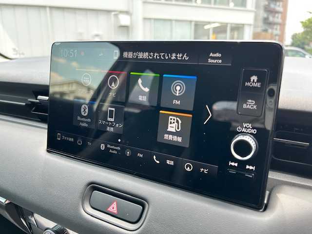 ホンダ ヴェゼル ハイブリッド e:HEV Z 東京都 2022(令4)年 1.3万km プラチナホワイトパール 走行距離12984km/ワンオーナー/純正メモリーナビ（AM・FM・フルセグ・BT）/ホンダセンシング/・衝突軽減ブレーキ/・誤発進抑制機能/・渋滞追従機能付アダプティブクルーズコントロール/・車線維持支援システム/・路外逸脱抑制機能/・オートハイビーム/全方位カメラ/ブラインドスポットモニター/シーケンシャルターンランプ/ハンズフリーパワーバックドア/ハーフレザーシート（合皮）/シートヒーター/コーナーセンサー（前後）/ETC2.0/ドライブレコーダー（前後）/置き充電/保証書、取説/スペアキー有り（1本）