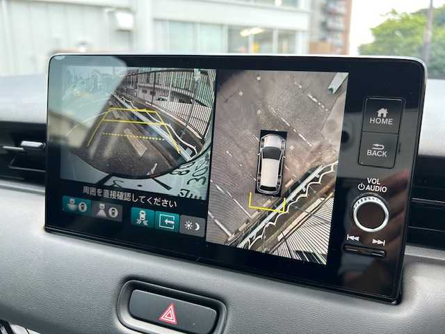 ホンダ ヴェゼル ハイブリッド e:HEV Z 東京都 2022(令4)年 1.3万km プラチナホワイトパール 走行距離12984km/ワンオーナー/純正メモリーナビ（AM・FM・フルセグ・BT）/ホンダセンシング/・衝突軽減ブレーキ/・誤発進抑制機能/・渋滞追従機能付アダプティブクルーズコントロール/・車線維持支援システム/・路外逸脱抑制機能/・オートハイビーム/全方位カメラ/ブラインドスポットモニター/シーケンシャルターンランプ/ハンズフリーパワーバックドア/ハーフレザーシート（合皮）/シートヒーター/コーナーセンサー（前後）/ETC2.0/ドライブレコーダー（前後）/置き充電/保証書、取説/スペアキー有り（1本）