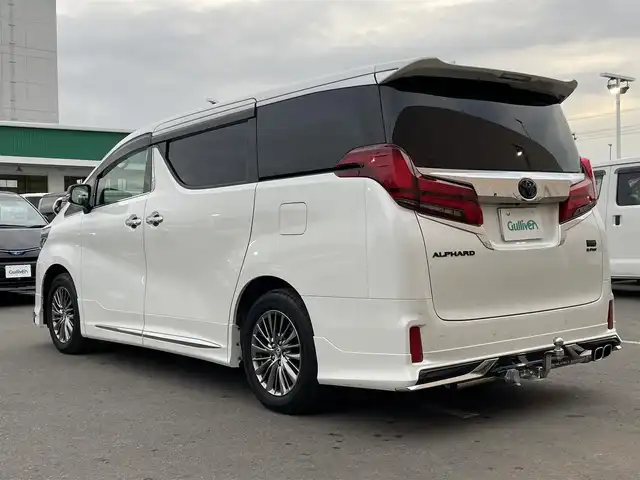 トヨタ アルファードハイブリット SR Cパッケージ 東京都 2022(令4)年 2.6万km ホワイトパールクリスタルシャイン 4WD/純正9インチディスプレイオーディオ/サンルーフ/モデリスタフルエアロ/ブラックレザーシート/デジタルインナーミラー/ブラインドスポットモニター/ETC2.0/トヨタセーフティセンス/レーダークルーズコントロール/両側パワースライドドア/パワーバックドア/前席シートヒーター/ベンチレーション/運転席メモリーシート/ステアリングヒーター/3眼LEDヘッドランプ/シグネチャーイルミブレード/前後ドライブレコーダー/純正バイザー/エグゼクティブラウンジ専用AW/車内カーテン