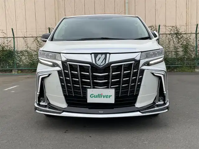 トヨタ アルファードハイブリット SR Cパッケージ 東京都 2022(令4)年 2.6万km ホワイトパールクリスタルシャイン 4WD/純正9インチディスプレイオーディオ/サンルーフ/モデリスタフルエアロ/ブラックレザーシート/デジタルインナーミラー/ブラインドスポットモニター/ETC2.0/トヨタセーフティセンス/レーダークルーズコントロール/両側パワースライドドア/パワーバックドア/前席シートヒーター/ベンチレーション/運転席メモリーシート/ステアリングヒーター/3眼LEDヘッドランプ/シグネチャーイルミブレード/前後ドライブレコーダー/純正バイザー/エグゼクティブラウンジ専用AW/車内カーテン