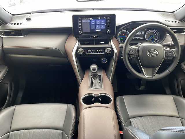 トヨタ ハリアー ハイブリッド G 沖縄県 2020(令2)年 4万km スティールブロンドM 純正ディスプレイオーディオ　ナビ付/　（フルセグTV/ラジオ/Bluetooth）/バックカメラ/ドライブレコーダー/ブラインドスポットモニター/電動パーキングブレーキ/パワーバックドア/純正デジタルインナーミラー/ハーフレザーシート/トヨタセーフティセンス/・衝突被害軽減ブレーキ (プリクラッシュセーフティ)																									/・ハンドル操作サポート (レーントレーシングアシスト)																									/・追従ドライブ支援機能 (レーダークルーズコントロール)																									/・車線はみ出しアラート (レーンディパーチャーアラート)																									/・自動ハイビーム (オートマチックハイビーム)	/スマートキー/スペアキー/プッシュスタート/純正フロアマット/純正18インチアルミホイール/LEDヘッドライト/オートライト/保証書/取扱説明書