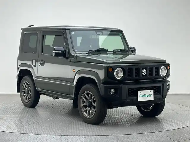 スズキ ジムニー XC 兵庫県 2019(令1)年 2.4万km ジャングルグリーン ・純正メモリナビ/（CD、DVD、SD、BT、フルセグ）　/・クルーズコントロール/・LKA/・PCS/・トランスファー/・社外インテークチャンバー/・４WD　/・前後ドライブレコーダー　/・ビルトインETC　/・バックカメラ　/・シートヒーター　/・純正ラバーマット　/・純正16インチAW　/・背面タイヤ　/・ROSSOMODELOOマフラー　/・純正マフラー積込/・純正バイザー/・純正リアスポイラー/・社外フューエルリッド/・LEDヘッドライト/・LEDフォグランプ/・社外ウーファー