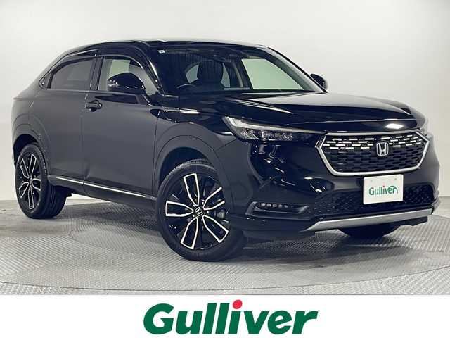 ホンダ ヴェゼル ハイブリッド e:HEV Z 広島県 2021(令3)年 3.3万km クリスタルブラックパール 純正９型ナビ　/シートヒーター　/フルセグＴＶ　/バックカメラ/レーダークルーズコントロール　/パワーバックドア　/ステアリングヒーター　/オートハイビーム　/ワイヤレス充電　/レーンキープアシスト　/ETC　/ドラレコ/純正18インチアルミホイール(225/50/R18)/エアバック（運転席/助手席/サイド/カーテン）