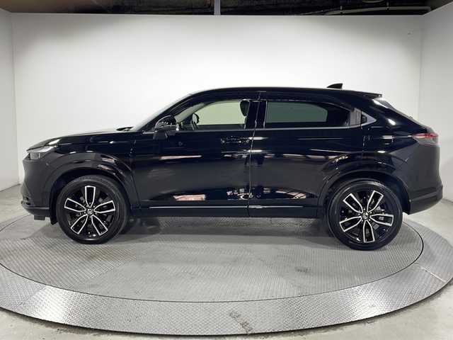 ホンダ ヴェゼル ハイブリッド e:HEV Z 広島県 2021(令3)年 3.3万km クリスタルブラックパール 純正９型ナビ　/シートヒーター　/フルセグＴＶ　/バックカメラ/レーダークルーズコントロール　/パワーバックドア　/ステアリングヒーター　/オートハイビーム　/ワイヤレス充電　/レーンキープアシスト　/ETC　/ドラレコ/純正18インチアルミホイール(225/50/R18)/エアバック（運転席/助手席/サイド/カーテン）