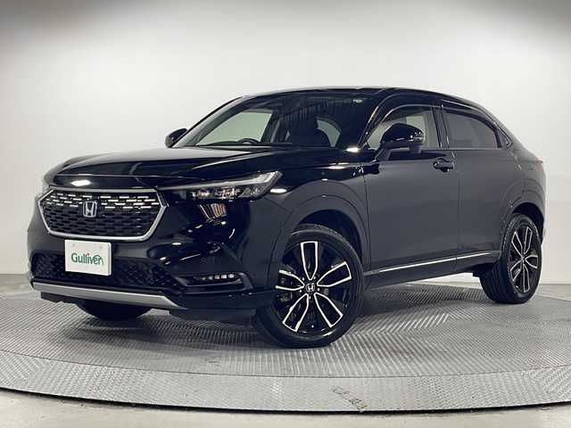 ホンダ ヴェゼル ハイブリッド e:HEV Z 広島県 2021(令3)年 3.3万km クリスタルブラックパール 純正９型ナビ　/シートヒーター　/フルセグＴＶ　/バックカメラ/レーダークルーズコントロール　/パワーバックドア　/ステアリングヒーター　/オートハイビーム　/ワイヤレス充電　/レーンキープアシスト　/ETC　/ドラレコ/純正18インチアルミホイール(225/50/R18)/エアバック（運転席/助手席/サイド/カーテン）