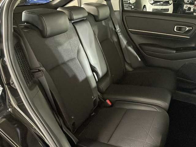 ホンダ ヴェゼル ハイブリッド e:HEV Z 広島県 2021(令3)年 3.3万km クリスタルブラックパール 純正９型ナビ　/シートヒーター　/フルセグＴＶ　/バックカメラ/レーダークルーズコントロール　/パワーバックドア　/ステアリングヒーター　/オートハイビーム　/ワイヤレス充電　/レーンキープアシスト　/ETC　/ドラレコ/純正18インチアルミホイール(225/50/R18)/エアバック（運転席/助手席/サイド/カーテン）