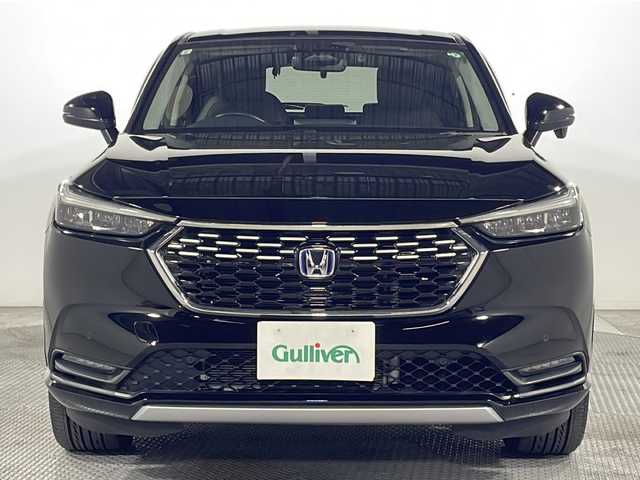 ホンダ ヴェゼル ハイブリッド e:HEV Z 広島県 2021(令3)年 3.3万km クリスタルブラックパール 純正９型ナビ　/シートヒーター　/フルセグＴＶ　/バックカメラ/レーダークルーズコントロール　/パワーバックドア　/ステアリングヒーター　/オートハイビーム　/ワイヤレス充電　/レーンキープアシスト　/ETC　/ドラレコ/純正18インチアルミホイール(225/50/R18)/エアバック（運転席/助手席/サイド/カーテン）