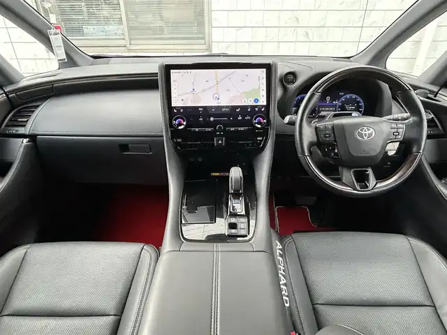 トヨタ アルファードハイブリット Z 福岡県 2024(令6)年 1.9万km プラチナホワイトパールマイカ ワンオーナー/左右独立ムーンルーフ（電動シェード付）/純正12.1インチフリップダウンモニター【V12T-R72C】/アドバンスドパーク/純正14インチコネクティッドナビ/　（Miracast/Bluetooth/フルセグTV/ナビ有）/フロント/サイド/バックカメラ/パノラミックビューモニター/トヨタセーフティーセンス/・・プリクラッシュセーフティ/・レーンディバーチャーアラート/・レーダークルーズコントロール/・レーンチェンジアシスト/・ロードサインアシスト/・プロアクティブドライビングアシスト/・フロント/リアトラフィックアラート/・ブラインドスポッドモニター/・安心降車アシスト/・後方車両接近告知/・パーキングサポートブレーキ/・クリアランスソナー/・リアカメラディテクション/オートマチックハイビーム/AC100V/純正18インチAW/両側パワースライドドア/パワーバックドア/黒色レザーシート/シートメモリ（D席）/パワーシート（D/N/）/シートヒーター/エアシート（D/N/2列目）/ステアリングヒーター/ビルトインETC2.0/デジタルインナーミラー/後席サンシェード/スペアキー×1/保証書