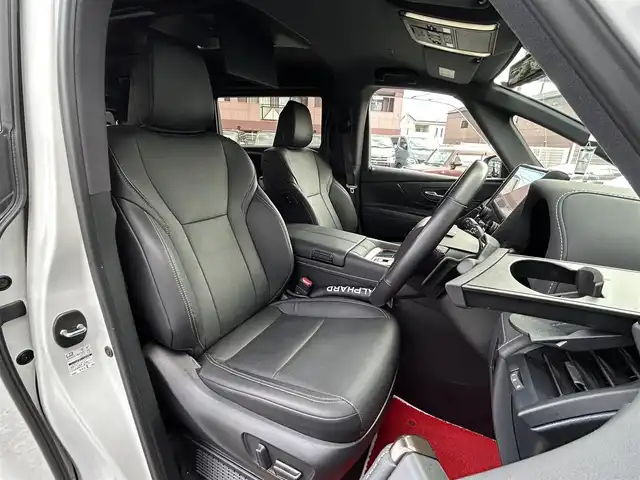 トヨタ アルファードハイブリット Z 福岡県 2024(令6)年 1.9万km プラチナホワイトパールマイカ ワンオーナー/左右独立ムーンルーフ（電動シェード付）/純正12.1インチフリップダウンモニター【V12T-R72C】/アドバンスドパーク/純正14インチコネクティッドナビ/　（Miracast/Bluetooth/フルセグTV/ナビ有）/フロント/サイド/バックカメラ/パノラミックビューモニター/トヨタセーフティーセンス/・・プリクラッシュセーフティ/・レーンディバーチャーアラート/・レーダークルーズコントロール/・レーンチェンジアシスト/・ロードサインアシスト/・プロアクティブドライビングアシスト/・フロント/リアトラフィックアラート/・ブラインドスポッドモニター/・安心降車アシスト/・後方車両接近告知/・パーキングサポートブレーキ/・クリアランスソナー/・リアカメラディテクション/オートマチックハイビーム/AC100V/純正18インチAW/両側パワースライドドア/パワーバックドア/黒色レザーシート/シートメモリ（D席）/パワーシート（D/N/）/シートヒーター/エアシート（D/N/2列目）/ステアリングヒーター/ビルトインETC2.0/デジタルインナーミラー/後席サンシェード/スペアキー×1/保証書