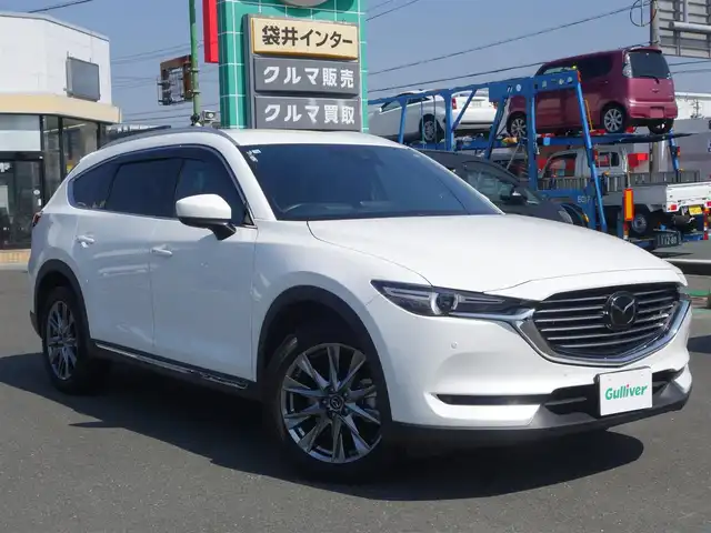 マツダ ＣＸ－８ 25S Lパッケージ 静岡県 2020(令2)年 1.7万km スノーフレイクホワイトパールマイカ ワンオーナー／禁煙車/7人乗り/走行距離17千キロ/マツダセーフティ/　・アドバンススマートシティブレーキ/　・ブラインドスポットモニター/　・レーンキープアシスト/　・オートクルーズコントロール/　・パーキングセンサー（フロント／リア）/メーカー純正SDナビ/　CD/DVD/BT/USB/AUX/AppleCarPlay／Android audio／フルセグTV（TVキット有）/全方位モニター/ETC/純正前後ドライブレコーダー/ヘッドアップディスプレイ/ステアリングヒーター/本革シート（ディープレッド）/前席シートヒーター／ベンチレーション/2列目手動カーテン/防眩ミラー/パワーバックドア/アクティブLEDヘッドライト/ルーフレール/プッシュスタート／スマートキー2個/純正フロアマット／ドアバイザー/取扱説明書／保証書