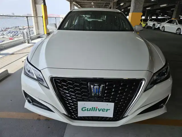 トヨタ クラウン ハイブリッド S エレガンススタイル 長崎県 2020(令2)年 7.2万km ホワイトパールクリスタルシャイン 純正ナビ(CD/DVD/Blu-ray)/フルセグTV/パノラミックビューモニター/ビルトインETC/レーダークルーズコントロール/クリアランスソナー/セーフティセンス/・レーントレーシングアシスト/・プリクラッシュセーフティ/・オートマチックハイビーム/・ロードサインアシスト/・先行車発進告知機能/ブラインドスポットモニター/パーキングサポートブレーキ/インテリジェントパーキングアシスト2/LEDヘッドランプ/本革巻きステアリング/ステアリングヒーター/パドルシフト/合皮/ヌバック調コンビシート/前席パワーシート/シートヒーター/純正18インチアルミホイール/スマートエントリー/スタートシステム/禁煙車