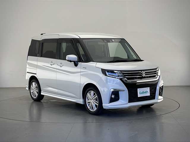 スズキ ソリオ HV MZ 長野県 2023(令5)年 2.4万km ピュアホワイトP 4WD/純正ナビ　/（フルセグ/Bluetooth/CD/DVD/アップルカープレイ/アンドロイドオート）/全方位モニター/両側電動スライドドア/ETC/デュアルブレーキサポート/レーンキープアシスト/レーダークルーズコントロール/コーナーセンサー/LEDヘッドライト/LEDフォグランプ/ヘッドアップディスプレイオーディオ/後席サーキュレーター/スマートキー/スペアキー