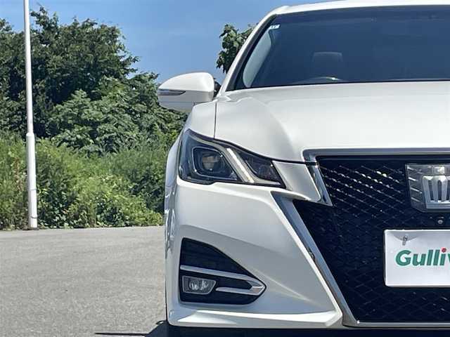 トヨタ クラウン アスリート S-T 山形県 2015(平27)年 5.6万km ホワイトパールクリスタルシャイン サンルーフ/純正メモリナビ/　　【CD　DVD　BT　フルセグ　USB　AUX　MSV】/バックカメラ/追従型クルーズコントロール/LEDオートライト/レザー調シートカバー/純正20インチアルミホイール/パドルシフト/アイドリングストップ/横滑り防止装置/純正フロアマット/電動格納ウィンカーミラー/スマートキー×２/ETC