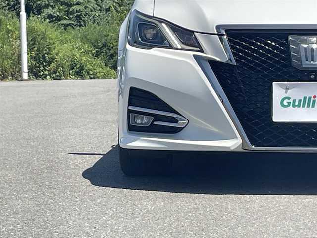 トヨタ クラウン アスリート S-T 山形県 2015(平27)年 5.6万km ホワイトパールクリスタルシャイン サンルーフ/純正メモリナビ/　　【CD　DVD　BT　フルセグ　USB　AUX　MSV】/バックカメラ/追従型クルーズコントロール/LEDオートライト/レザー調シートカバー/純正20インチアルミホイール/パドルシフト/アイドリングストップ/横滑り防止装置/純正フロアマット/電動格納ウィンカーミラー/スマートキー×２/ETC