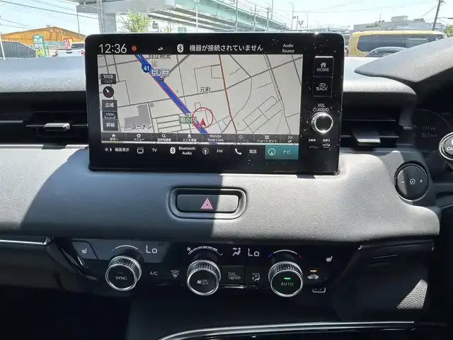 ホンダ ヴェゼル ハイブリッド e:HEV Z 愛知県 2022(令4)年 8万km プレミアムサンライトホワイトパール ホンダコネクトナビ/（BT/FM/AM/USB)/フルセグTV/ホンダセンシング/ブラインドスポットインフォメーション/全方位カメラ/ドライブレコーダー/ETC2.0/ワイヤレス充電器/親水/ヒーテッドドアミラー/熱線入りフロントウィンドウ/運転席＆助手席シートヒーター/ハンズフリーアクセスパワーテールゲート/１８インチ純正AW/LEDヘッドライト/革巻きステアリング/ステアリングスィッチ/スマートキー/フロアマット