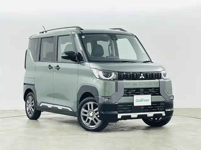 三菱 デリカミニ T プレミアム 福島県 2025(令7)年 0.1千km 緑 届出済未使用車/衝突軽減ブレーキ/・車線逸脱警報装置/・マイパイロット/・先行車発進お知らせ機能/・標識認識機能/・クリアランスソナー/純正9インチディスプレイオーディオ/・Bluetooth/USB/AM/FM/・全方位カメラ/・デジタルインナーミラー/両側パワースライドドア/アイドリングストップ/ダウンヒルアシストコントロール/電子パーキング/・オートホールド/革巻きステアリング/・ステアリングリモコン/・ステアリングヒーター/・パドルシフト/ハーフレザーシート/・シートヒーター(運転席/助手席)/LEDヘッドライト/・オートライト/・フォグライト/・ヘッドライトレベライザー/ルーフレール