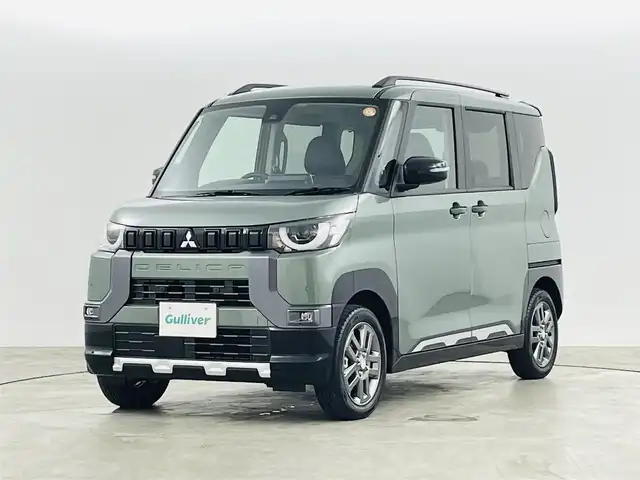 三菱 デリカミニ T プレミアム 福島県 2025(令7)年 0.1千km 緑 届出済未使用車/衝突軽減ブレーキ/・車線逸脱警報装置/・マイパイロット/・先行車発進お知らせ機能/・標識認識機能/・クリアランスソナー/純正9インチディスプレイオーディオ/・Bluetooth/USB/AM/FM/・全方位カメラ/・デジタルインナーミラー/両側パワースライドドア/アイドリングストップ/ダウンヒルアシストコントロール/電子パーキング/・オートホールド/革巻きステアリング/・ステアリングリモコン/・ステアリングヒーター/・パドルシフト/ハーフレザーシート/・シートヒーター(運転席/助手席)/LEDヘッドライト/・オートライト/・フォグライト/・ヘッドライトレベライザー/ルーフレール