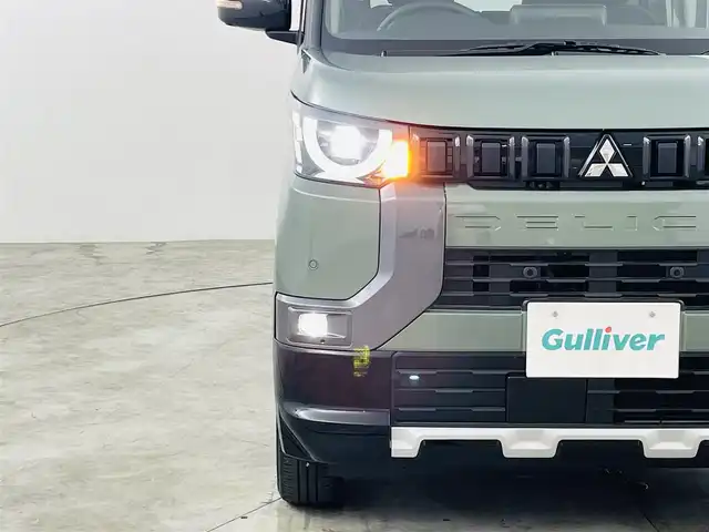 三菱 デリカミニ T プレミアム 福島県 2025(令7)年 0.1千km 緑 届出済未使用車/衝突軽減ブレーキ/・車線逸脱警報装置/・マイパイロット/・先行車発進お知らせ機能/・標識認識機能/・クリアランスソナー/純正9インチディスプレイオーディオ/・Bluetooth/USB/AM/FM/・全方位カメラ/・デジタルインナーミラー/両側パワースライドドア/アイドリングストップ/ダウンヒルアシストコントロール/電子パーキング/・オートホールド/革巻きステアリング/・ステアリングリモコン/・ステアリングヒーター/・パドルシフト/ハーフレザーシート/・シートヒーター(運転席/助手席)/LEDヘッドライト/・オートライト/・フォグライト/・ヘッドライトレベライザー/ルーフレール