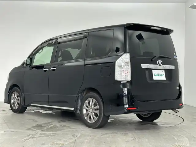 トヨタ ヴォクシー ZS 煌Ⅱ 愛知県 2011(平23)年 5.7万km ブラック 純正ディーラーオプション7インチHDDナビ/フルセグTV/バックカメラ/純正9インチ後席フリップダウンモニター/ビルトインETC/ステアリングスイッチ/オートエアコン/両側パワースライドドア/キャプテンシート/純正16インチアルミホイール/LEDヘッドライト/フロントフォグランプ/電動格納ウィンカーミラー/ドアバイザー/スマートキー