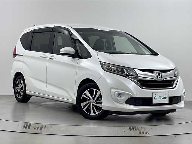 ホンダ フリード G ホンダセンシング 埼玉県 2018(平30)年 6.5万km ホワイトオーキッドパール 純正ナビ　/バックカメラ　/両側パワースライドドア　/デジタルインナーミラー　/ホンダセンシング　/ビルトインＥＴＣ　/ハーフレザーシート　/Ｙｕｐｉｔｅｌ製セーフティーレーダー　/ＬＥＤライト　/オートライト/前後ドライブレコーダー