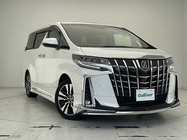 トヨタ アルファード S Cパッケージ 沖縄県 2022(令4)年 2.1万km ホワイトパールクリスタルシャイン 10．5型ナビ＋JBLプレミアムサウンド（MOP)/　BD/DVD/CD/SD/AM/FM/USB/フルセグ/パノラミックビューモニター（MOP)/13.3型リアエンターテインメントシステム（MOP)/ツインムーンルーフ（MOP)/モデリスタエアロ（F・S・R）/デジタルインナーミラー（MOP)/両側パワースライドドア/パワーバックドア/ビルトインETC2.0/前後ドライブレコーダー（ZDR016）/トヨタセーフティセンス/ブラインドスポットモニター（MOP)/インテリジェントパーキングアシスト（MOP)/合皮シート/1・2列目パワーシート/前席シートヒーター/前席シートエアコン/ステアリングヒーター/LEDヘッドライト/オートライト/アクセサリーコンセント（AC100V)/純正18インチAW/スペアタイヤ（MOP)/純正フロアマット/プッシュスタート/スマートキ―/取扱説明書/保証書